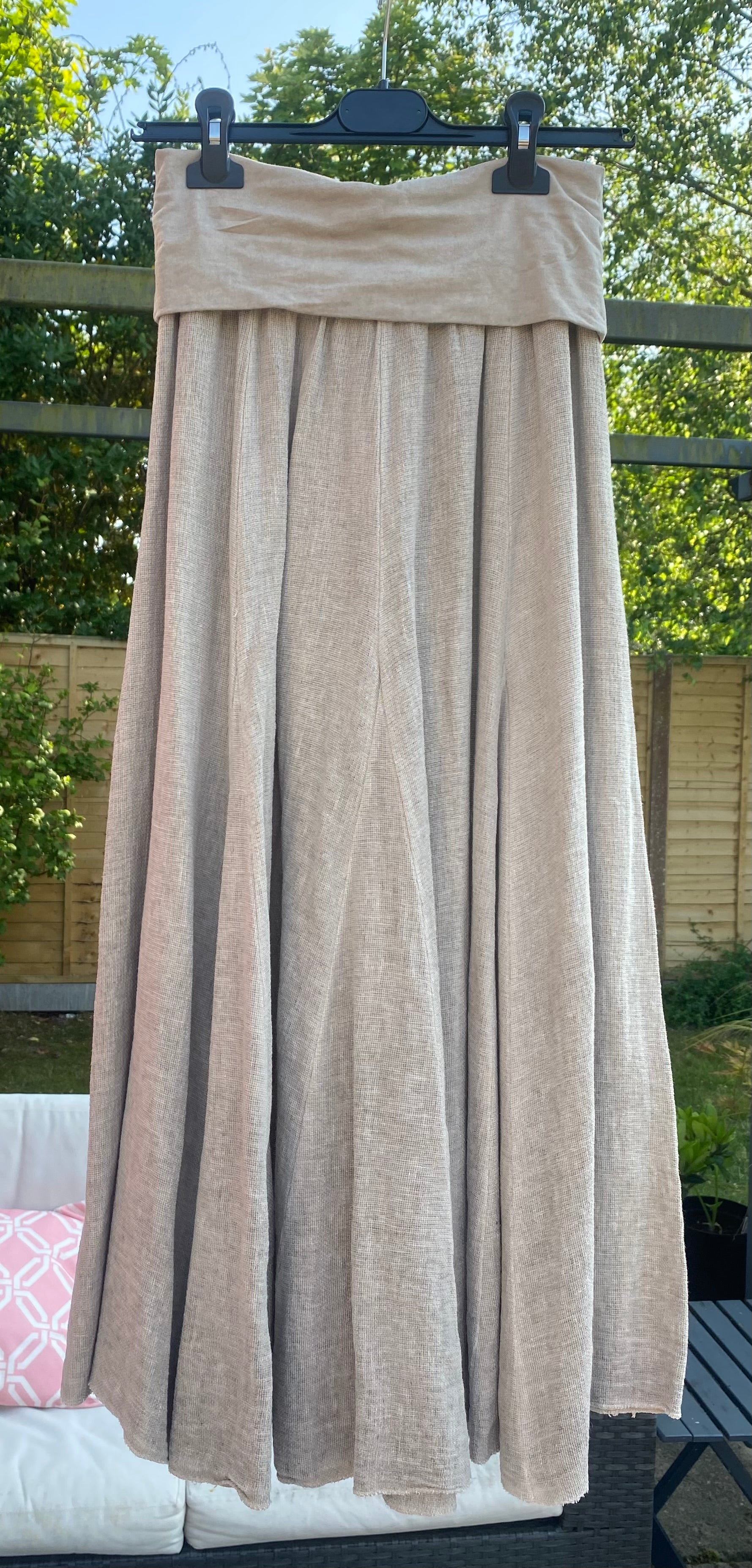 Mocha washed linen sugarbabe maxi skirt hanging up outside in the garden 