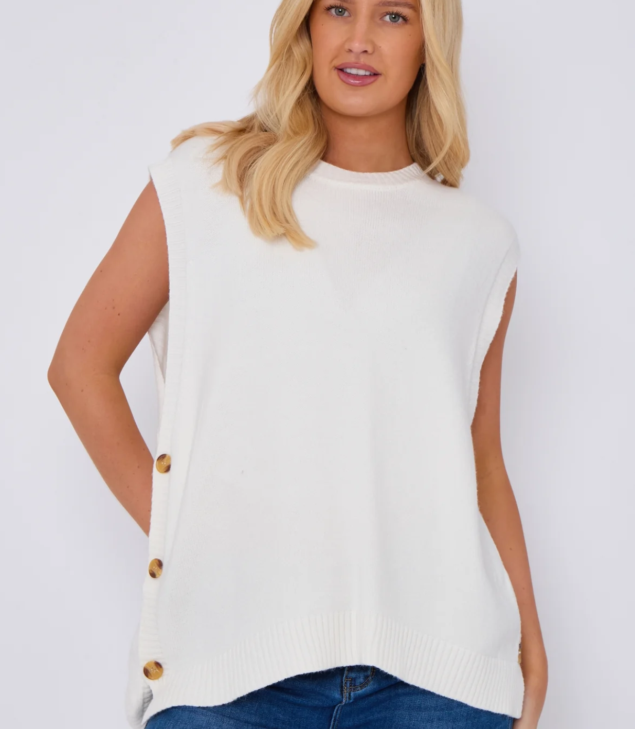 model wearing white knitted round neck side button vest