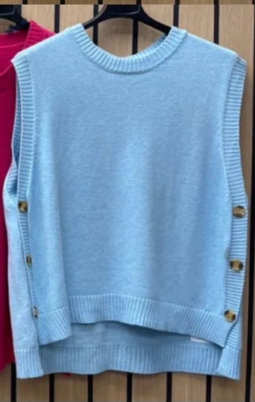 denim blue side button soft knit vest with round neck ona hanger 