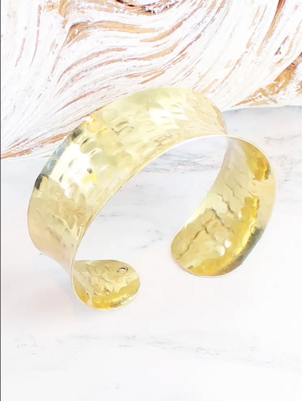 photo of beaten metal solid cuff in gold plated bronze