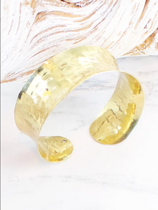 photo of beaten metal solid cuff in gold plated bronze
