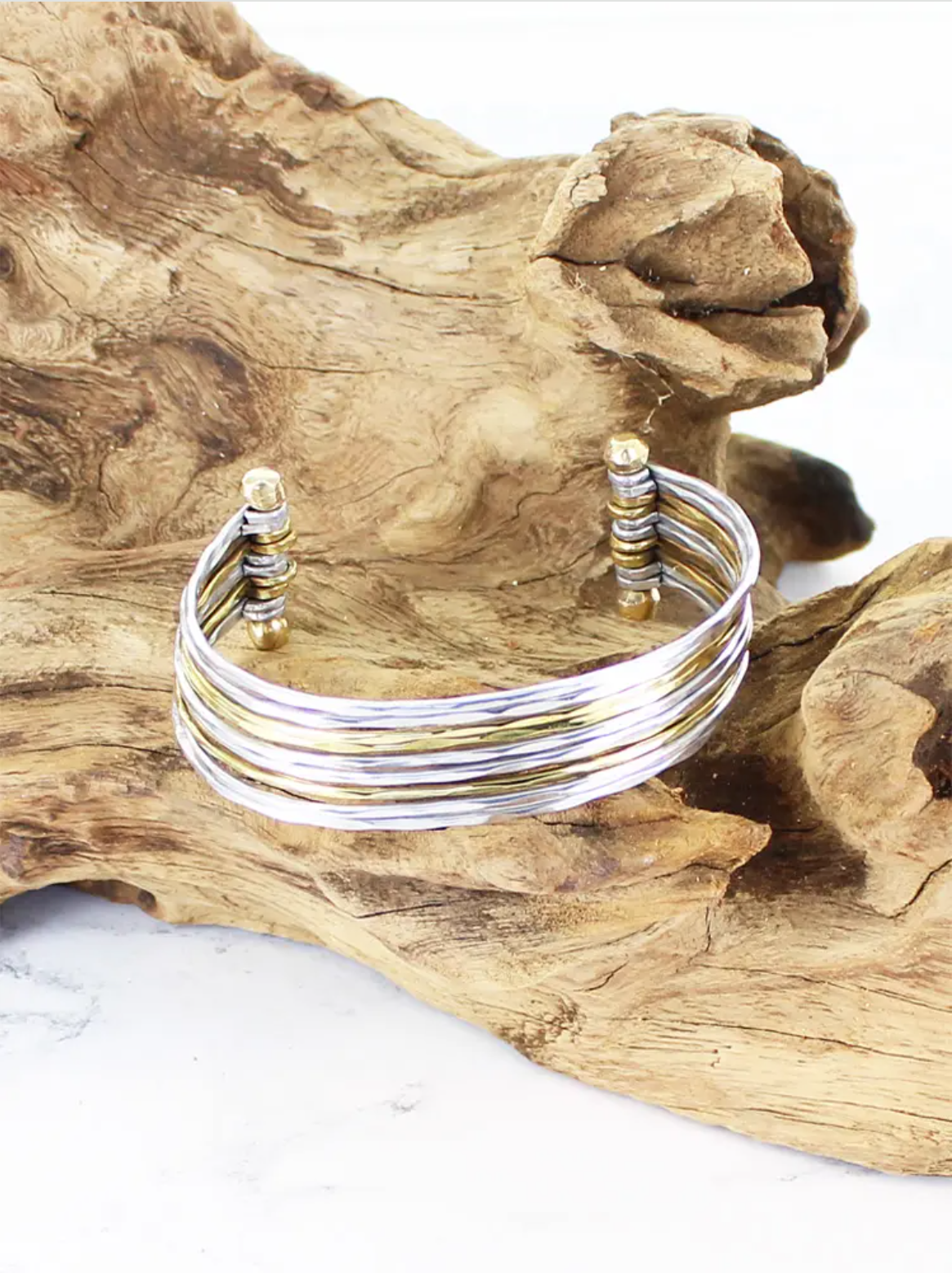 photo of narrow multi strand bar cuff in silver and gold plated brass