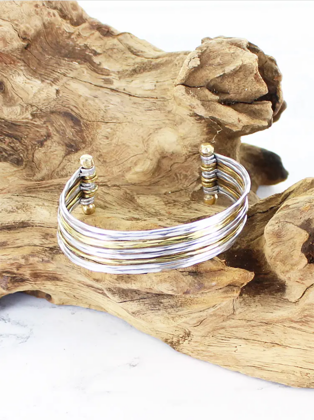 photo of narrow multi strand bar cuff in silver and gold plated brass