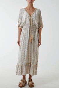 stone colour kaftan style dress with tassel details