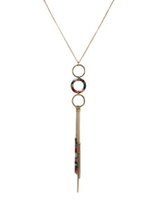 A gold necklace with gold and multicolour resin hoops, gold chain and resin drops 