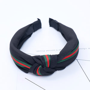 Black hairband with green and red stripe 