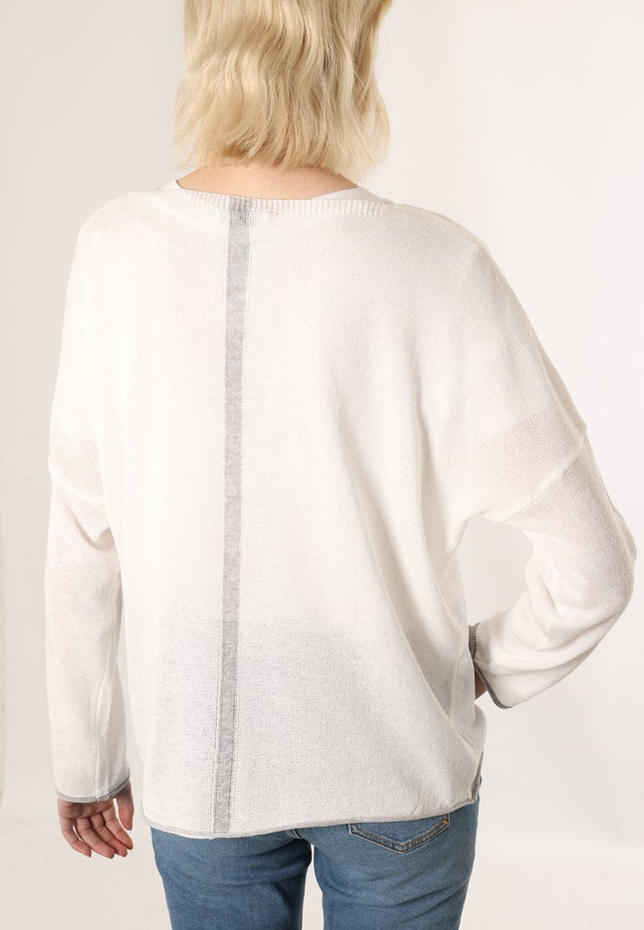 White cotton jumper with silver trim and stripe down back