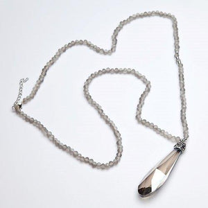 Long pendant necklace with grey beads and grey crystal teardrop