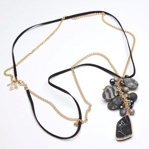 Double strand gold and black necklace with natural stone pendant and beads