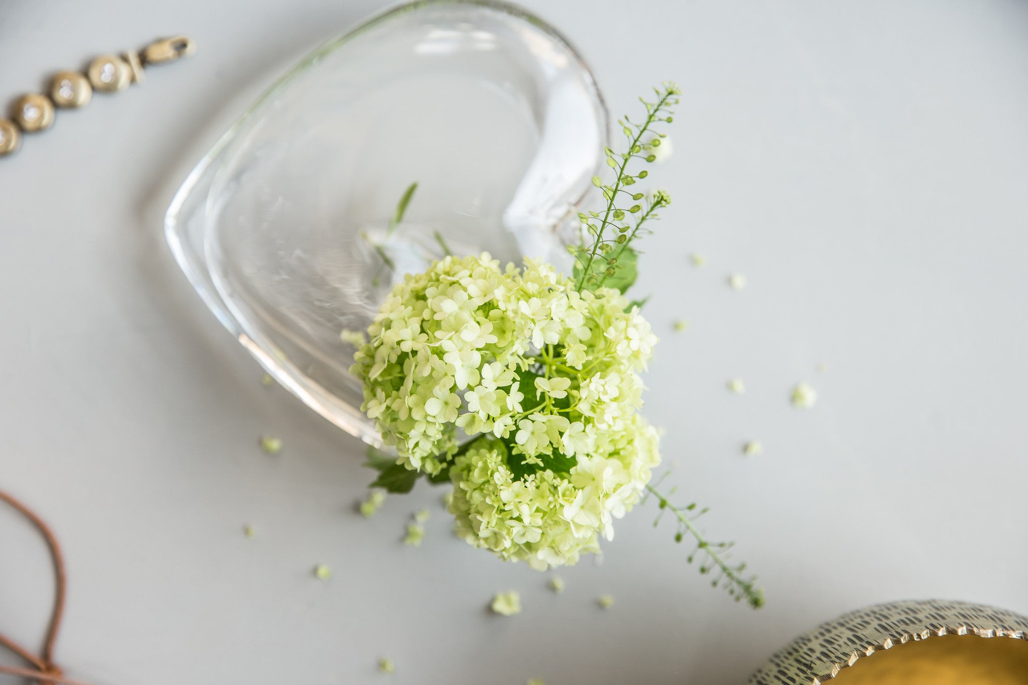 Shallow glass heart vase with small bud opening 