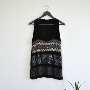 Black short sleeve top with aztec sequin design in gold black and silver