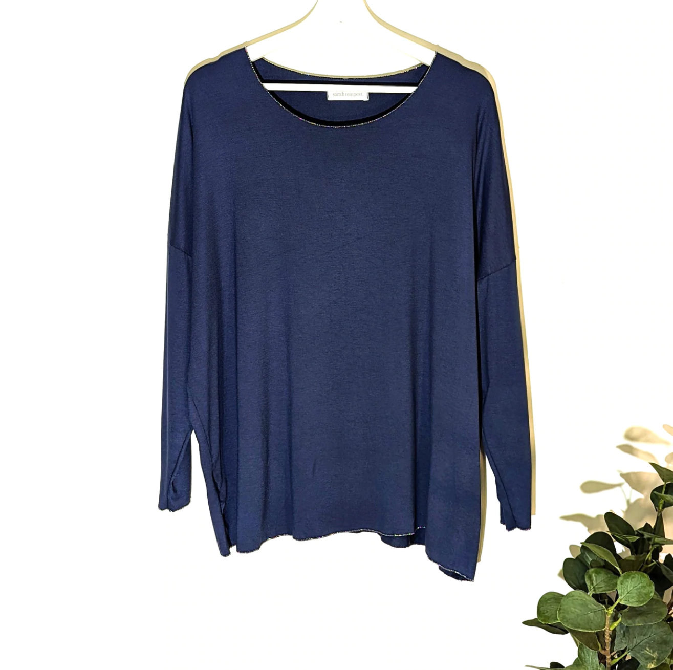 dark blue super soft long sleeve top with silver trim