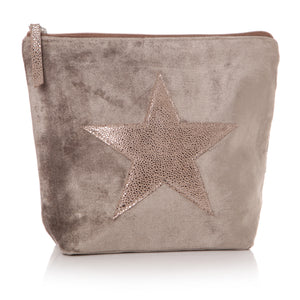 Beige velvet make up bag with gold star on front and gold pull