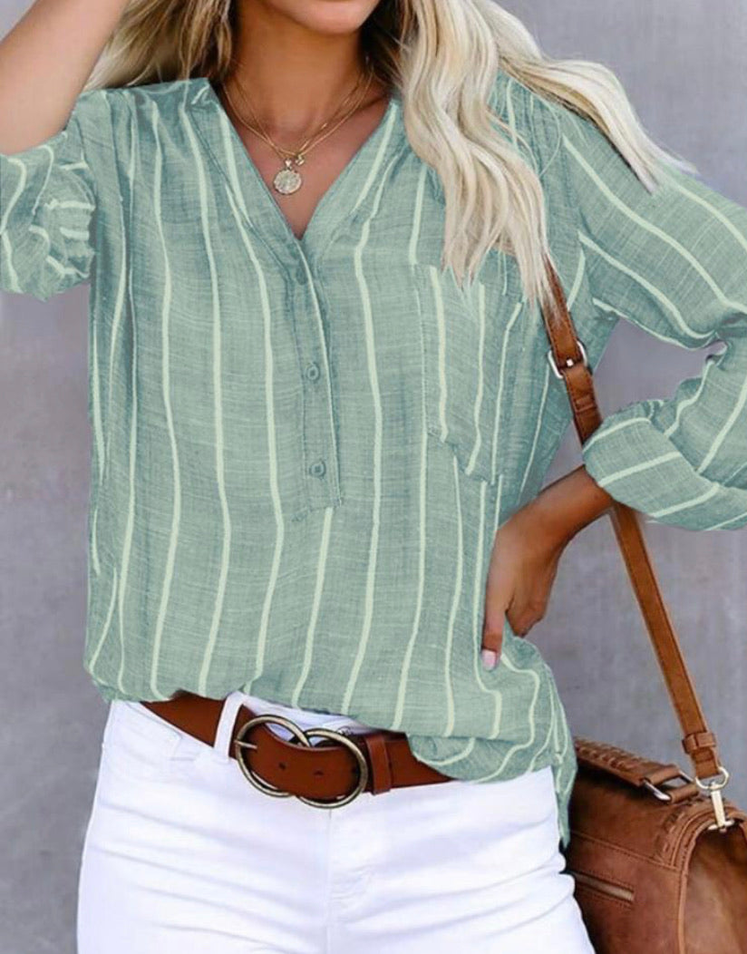 model wearing a long sleeve striped viscose shirt in pastel green