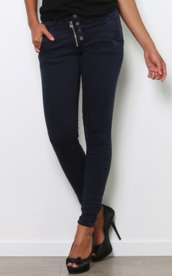 Model wearing navy melly jeans and heels